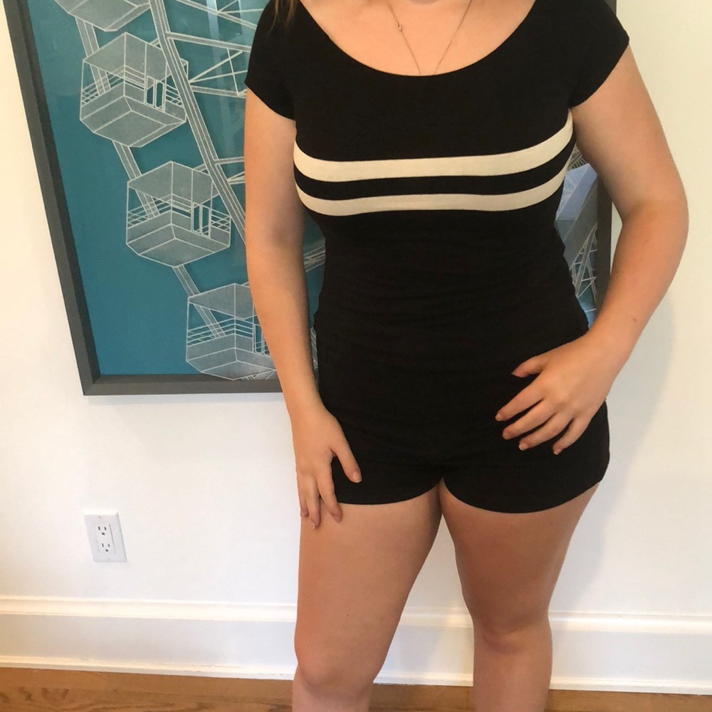 Black tight top with white stripes